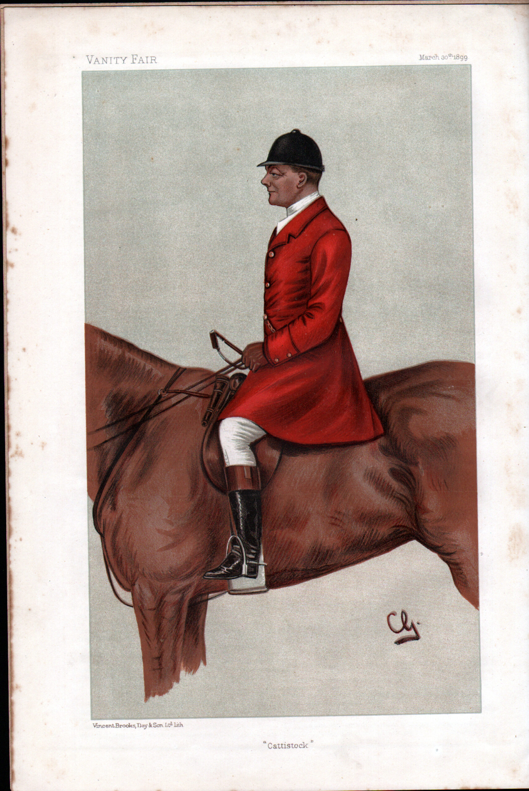 Man in red hunting attire on horseback.